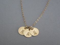 "♥ Gold filled chain & clasp ♥ 9mm light weighted gold filled discs ♥ Display necklace shows UNDARKENED BLOCK initials ♥ Please indicate your desired initials in the \"Note to Seller\" box during checkout ♥ Necklace length is TOTAL length, includes the spring clasp and the jump ring ♥ 1-disc GOLD FILLED necklace: https://www.etsy.com/listing/163598308/ ♥ 2-disc GOLD FILLED necklace: https://www.etsy.com/listing/163603351/ ♥ 3-disc GOLD FILLED necklace: https://www.etsy.com/listing/163582966/ Round Charm Necklaces For Wedding, Gold Charm Necklaces For Wedding, Gold Jewelry With Name For Bridesmaid Gift, Nickel Free Gold Necklace For Bridesmaid Gift, Nickel-free Gold Necklace For Bridesmaid Gift, Gold Charm Necklace For Wedding, 14k Gold Round Charm Necklaces For Wedding, Gold Charm Necklace With Round Pendant For Wedding, Gold Name Disc Jewelry