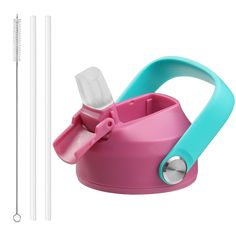 a pink and blue teapot with two straws in it next to a toothbrush holder