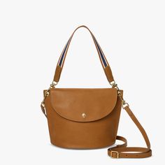 Convertible Birdy Bucket Bag | Shinola® Detroit Versatile Crossbody Bucket Bag With Detachable Handle, Everyday Bucket Shoulder Bag With Gold-tone Hardware, Gold-tone Hardware Bucket Shoulder Bag, Versatile Saddle Bag With Gold-tone Hardware For Everyday, Leather Handle Crossbody Bucket Bag For On-the-go, Versatile Top Handle Bucket Bag With Gold-tone Hardware, Versatile Everyday Bucket Bag With Gold-tone Hardware, Everyday Bucket Hobo Bag With Detachable Strap, Everyday Use Hobo Bag With Detachable Strap