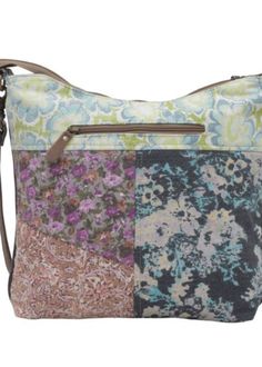 A perfect blend of style, functionality, and durability, this bag is designed for the modern woman on the go. The unique patchwork design combines vibrant floral prints on canvas with high-quality leather accents, creating an eye-catching piece that adds a splash of color and elegance to any outfit. The exterior of the bag boasts three convenient zipper pockets (one on the back and two on the front), ensuring your essentials are secure yet easily accessible. The full zip-top closure further secu Multicolor Patchwork Hobo Bag For Everyday Use, Multicolor Patchwork Hobo Bag For Daily Use, Daily Use Multicolor Patchwork Hobo Bag, Casual Multicolor Patchwork Hobo Bag, Floral Print Satchel For Everyday Spring Use, Multicolor Patchwork Satchel For Daily Use, Spring Floral Print Satchel For Everyday Use, Floral Print Leather Shoulder Bag, Spring Canvas Bag With Zipper Closure