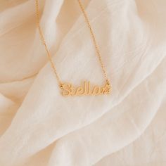 Give a meaningful gift to your child that they will wear every day with our Custom Kid’s Name Necklace. Both dainty and minimalist, this necklace can be personalized with any name and can even include cute symbols to make this jewelry piece more unique. Material: High-Quality Solid 925 Sterling Silver Finish: Sterling Silver ∙ 18K Gold ∙ Rose Gold Dimensions: Depending on your font choice, height sizes range from 3mm to 4mm lowercase SKU: HH-NH02F87 Dainty Name Charm Necklace For Everyday, Dainty Adjustable Name Necklace, Dainty Everyday Name Charm Necklace, Everyday Custom Nameplate Charm Necklace, Adjustable Yellow Gold Name Necklace, Adjustable Yellow Gold Custom Name Necklace, Minimalist Customizable Necklace As Personalized Gift, Personalized Adjustable Yellow Gold Name Necklace, Customized Minimalist Name Necklace For Birthday