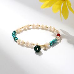 Bohemian Jewelry,This Natural Freshwater Pearl Color Matching Agate Turquoise Bracelet is perfect for any occasion. With its minimalistic design, it is the perfect way to make a subtle statement without being too over the top.This delicate beaded bracelet features a combination of natural freshwater pearl and agate turquoise stones. The bracelet is adjustable and can be tailored to fit any size. Perfect for those who want to keep their jewelry minimalistic yet make a stylish statement. This brac Turquoise Stones, Everyday Accessories, Minimalistic Design, Nature Bracelets, Spiritual Jewelry, Pearl Color, Over The Top, American Express, Natural Pearls