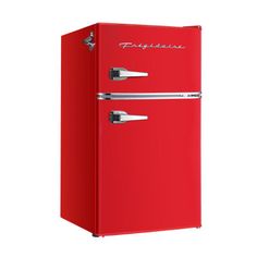 a red refrigerator freezer sitting on top of a white wall