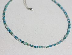 Handmade Light Blue Necklaces For Summer, Handmade Light Blue Necklace For Summer, Adjustable Blue Hypoallergenic Necklace, Adjustable Hypoallergenic Blue Necklaces, Adjustable Hypoallergenic Blue Necklace, Summer Blue Hypoallergenic Jewelry, Adjustable Turquoise Dainty Choker, Bohemian Light Blue Necklaces For Summer, Dainty Turquoise Adjustable Choker