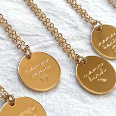 A minimalist, dainty engraved necklace for that special mom in your life ◦ Made with a coin shaped gold charm etched with mama bear or mama bird ◦ Grab two as matching necklaces for a mother daughter gift or a mother in law gift ◦ Style it differently every day - either solo or layer it with other necklaces ◦ Wear it to make a memorable baby announcement or give as a meaningful mother's day gift or baby shower gift ♡ GIFT WITH ⤵ Bow Holder: www.etsy.com/listing/1271744339 THE DETAILS ◦ Adjustabl Minimalist Medallion Necklace For Mother's Day, Stamped Charm Necklace For Mother's Day, Everyday Stamped Charm Necklace For Mother's Day, Everyday Mother's Day Charm Necklace With Round Disc, Everyday Round Disc Charm Necklace For Mother's Day, Minimalist Initial Pendant Coin Necklace For Gift, Minimalist Initial Pendant Coin Necklace As Gift, Minimalist Hand Stamped Charm Necklace For Mom, Minimalist Round Disc Charm Necklace For Mom