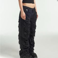 Charcoal Distressed Denim High Waist Ripped Black Pants, Black Ripped Wide Leg Bottoms, Black Ripped Wide Leg Pants, Ripped Wide Leg Black Bottoms, Black Wide Leg Ripped Bottoms, Black Punk Mid-rise Jeans, Black Mid-rise Punk Jeans, Black Ripped Edgy Pants, Black Distressed Wide Leg Jeans