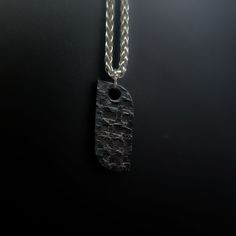 Mens Black Stainless Steel Necklace. The pictured pendant is aproximately 28 mm long by 13 mm wide. Forge, hammer, anvil-- all of my work uses blacksmith techniques and this piece is no different. This pendant is textured on one side and flat on the other. Because I hammer each pendant by hand, each piece comes out a little different. No two are the same, and each one contains little imperfections that set it apart from the others. The black finish is one formed from oxidizing the stainless stee Black Stainless Steel Necklace, Necklace Grunge, Grunge Necklace, Necklace Mens, Mens Pendant, Steel Necklace, Black Stainless Steel, Stainless Steel Necklace, Boyfriend Gifts