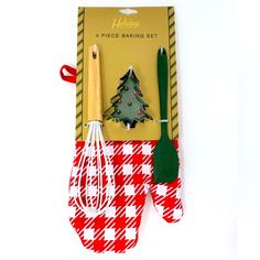 an assortment of kitchen utensils and christmas tree decoration on display in a package