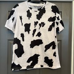 Fun Cow Printed Tee. Never Worn Casual Cow Print T-shirt For Summer, Casual Short Sleeve Cow Print Tops, Trendy Cow Print Top For Summer, White Cow Print Crew Neck T-shirt, White Cow Print Top For Summer, Casual Cotton T-shirt With Cow Print, Casual Cow Print Crew Neck Top, White Casual T-shirt With Cow Print, Casual Crew Neck Cow Print Tops