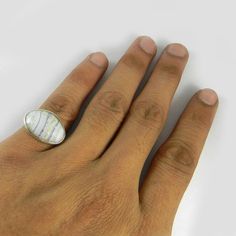 About The Ring:- Blue Lace Agate Gemstone 925 Sterling Silver Bezel Ring Ring Details :- Weight :- 2.00 Gram Approx . Stone Used :- Blue Lace Agate Stone Size :- 18x13 MM Metal Used :- 925 Sterling Silver Processing Time :- This is handmade item and we need 3-5 days to ship your order . Delivery Time :- Once Item is shipped parcel will delivered to you in 2-4 weeks . White Enamel Gemstone Ring, White Oval Chalcedony Rings, White Agate Rings With Natural Stones, White Agate Rings Suitable For Gifts, White Agate Rings Perfect For Gifts, White Agate Rings As A Gift, White Agate Rings For Gift, White Agate Gift Rings, Pomellato Ring