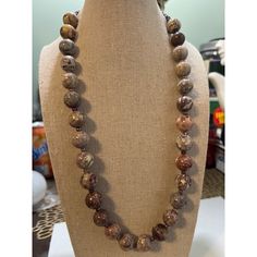 Genuine Marbled Taupe Agate Necklace -- 24". Another Great Looking Necklace Very Well Done In Marbled Agate Beads In Gorgeous Tones Of Gray, Brown, Red, White, And Black. The Beads Are Separated By Purple And Lavender Glass Beads With A Silver Floral Toggle Closure. Measurement: Length: 24"; Beads: .5"X.5". Item Has Never Been Worn And Has Been Sitting In A Drawer Until Now. Long Agate Beaded Necklace With Faceted Beads, Single Strand Agate Crystal Necklace With Round Beads, Single Strand Agate Round Necklace, Single Strand Round Agate Necklace, Round Agate Necklace With Faceted Beads, Faceted Agate Beads Long Necklace, Elegant Jasper Gemstone Beads Jewelry, Elegant Hand-strung Agate Necklace, Hand-strung Jasper Bead Necklaces