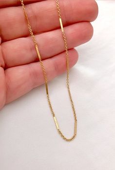 14k Gold Filled Flattened Bar Chain Necklace --- International Customers: Please be familiar with your country's policies in regards to customs fees prior to purchasing overseas. Any fees/taxes are the buyer's responsibility and may be charged at the time of delivery/pick-up. This is not included in the costs here. Thank you! This dainty, gold necklace is the piece of jewelry you can reach for on any occasion! Very subtle, yet eye catching! Features a 14k gold filled chain with a unique chain li Simple Paperclip Chain Necklace As Gift, Simple Paperclip Chain Necklace Gift, Minimalist Jewelry With Rectangular Link Clavicle Chain, Delicate Gift Chain Necklace With Paperclip Chain, Minimalist Clavicle Chain Jewelry With Rectangular Links, Minimalist Delicate Chain Necklace For Gifts, Minimalist Delicate Chain Necklace As Gift, Simple Cable Chain Jewelry Gift, Simple Cable Chain Jewelry As Gift