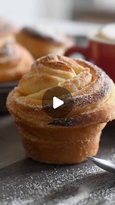 a video demonstrating how to make cupcakes with icing and powdered sugar