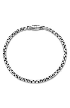 Medium-sized sterling-silver links bring understated shine to your ensemble with this gleaming box-chain bracelet masterfully crafted in the USA. 8" length Lobster clasp closure Sterling silver Made in the USA Classic Box Chain Link Bracelets, Everyday White Gold Sterling Silver Bracelet With Solid Link, Classic Silver Chain Link Bracelet, Classic Silver Cable Chain Bracelet, Timeless Link Chain Bracelet With Box Chain, Silver Tennis Bracelet With Solid Link Construction, Classic Sterling Silver Chain Link Bracelet, Classic Sterling Silver Chain Bracelet With Solid Links, Classic Round Chain Bracelet With Solid Links