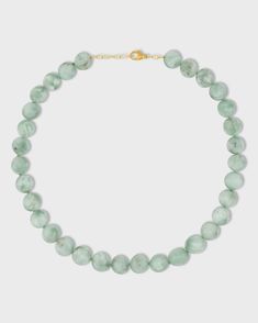 This elegant necklace features a polished jade sphere pendant suspended from a delicate 14k gold chain. Jade is a beautiful gemstone known for its calming properties. It has been revered for centuries for its beauty and durability. The smooth, polished sphere adds a touch of sophistication to the piece. This necklace is handcrafted in NYC and is a perfect everyday piece that adds a touch of natural beauty and serenity on any occasion. Jade 14 Karat Gold 16 to 17.5 inches Handmade in NYC Sphere Necklace, Jade Crystal, Elegant Necklace, Crystal Sphere, Elegant Necklaces, Gold Chain, Gold Chains, Natural Beauty, Jade