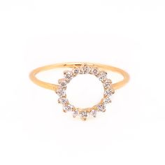 This ring adds a pop of sparkle to your look! With 0.23cttw round diamonds set in an open circle, it's the perfect statement piece. Available in 14K Yellow, White and Rose Gold. Rose gold is non-returnable!  If marked as pre-order, please allow 2-9 weeks for shipping! Elegant Diamond Midi Promise Rings, Cubic Zirconia Midi Rings With Diamond Accents, Elegant Diamond Midi Rings Round Cut, Dazzling Yellow Gold Rings For Party, Elegant White Gold Diamond Midi Rings, Dazzling Yellow Gold Party Rings, Fine Jewelry Flower Ring With Halo Design, Modern Cubic Zirconia Diamond Ring With Round Band, Cubic Zirconia Midi Rings For Promise