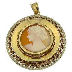 This Vintage Italian Cameo Pendant is a beautifully crafted piece of jewelry that combines the timeless elegance of cameo artistry with intricate goldwork. Made from luxurious 18kt yellow and white gold, this pendant showcases the exceptional craftsmanship and classic design for which Italian jewelry is renowned. The focal point of the pendant is a meticulously carved cameo depicting a woman's profile, rendered with exquisite detail and artistry. The cameo is set against a backdrop of warm yellow gold, which provides a rich contrast to the delicate carving. Surrounding the cameo is a border of hammered white gold, adding a touch of texture and sophistication to the design. The hammered finish creates a unique visual effect, enhancing the pendant's overall appeal and adding a contemporary t Ancient Sumerian, Hermes Kelly Bag, Cameo Jewelry, Warm Yellow, Vintage Cameo, Italian Jewelry, Shopping Photography, Cameo Brooch, Cameo Pendant