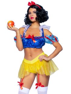 a woman dressed as snow white holding an apple