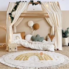 a bedroom with a canopy bed and balloons in the air on top of carpeted flooring