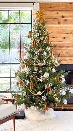 a decorated christmas tree in a living room