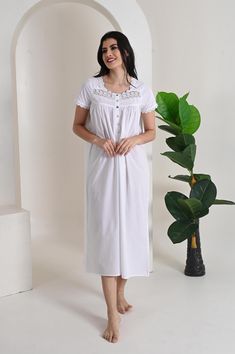 The perfect blend of comfort and charm with our cotton poplin nightgown, featuring short sleeves and a beautifully crafted lace trim neckline. Made from crisp, breathable cotton poplin, this nightgown offers a soft touch against the skin, ensuring a comfortable fit for warm nights. The short sleeves provide a relaxed yet polished look, while the elegant lace trim at the neckline adds a delicate, feminine touch. Falling gracefully to mid-calf, this nightgown showcases a flattering silhouette that Feminine White Dress, Nightgown Short, Delicate Feminine, Women's Nightgowns, Nightgowns, Victorian Style, Polished Look, Victorian Fashion, Cotton Poplin