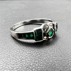 Beautiful And Absolutely Gorgeous 14k White Gold Ring. Embedded With Stunning Green Gemstones. Total Weight:2.2. Size 7.75. The Best Choice For You! Perfect Gift Silver Sterling Diamond Ring With Stone Setting, Formal Silver Birthstone Ring With Accent Stones, Silver Gemstones With Polished Finish, Silver Jewelry With Accent Stones In 14k White Gold, Polished Silver Gemstones For Anniversary, Silver Gemstones With Polished Finish For Anniversary, Classic Birthstone In White Gold Setting, Silver Emerald Birthstone Ring With Accent Stones, Silver Gemstone With Stone Setting For Anniversary