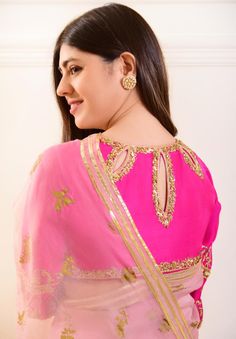 7 yards of pure luxury, indulge in “ Zeb “ adorned on pure organza in a dreamy pastel teapink shade with hand blocked motifs in an gold. The blouse is on pure raw silk 80 gms with intricate gold zardosi, for timeless elegance. The length of the saree blouse is 14 inches.You can mention your customised blouse size at th Wedding Blouse With Sheer Dupatta For Diwali, Designer Cutdana Organza Blouse, Designer Organza Blouse With Cutdana, Wedding Blouse With Sheer Dupatta For Eid, Anarkali Saree Style Organza Blouse, Diwali Sheer Dupatta Blouse In Dola Silk, Designer Organza Blouse With Resham Embroidery, Silk Blouse Piece With Gota Work For Reception, Organza Blouse With Cutdana For Reception