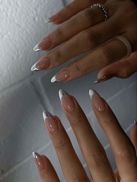 Almond Nails Silver Chrome, Chrome Silver Tip Nails, Nail Inspo Almond Silver, Silver Tips Acrylic Nails, Silver Chrome Acrylics, Silver Chrome Tips Nails, Silver Tip Almond Nails, Silver Crome Nails French Tip, Silver Biab Nails