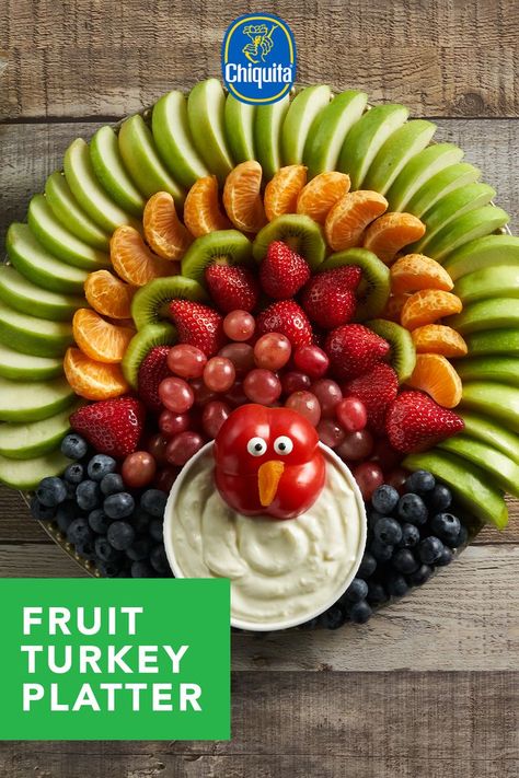 Looking for a fun and easy to make centrepiece for your Thanksgiving table? You’ll love our Fruit Turkey Platter. Made with Chiquita Bites® Sliced Juicy Green Apples and other fruit, this platter is really easy to assemble and particularly fun when you get your kids involved! Thanksgiving Fruit And Veggie Platter, Fruit Turkey Tray, Fun Thanksgiving Fruit Ideas, Creative Fruit Tray Ideas Thanksgiving Turkey, Turkey Fruit Charcuterie Board, Turkey Made Out Of Fruit, Thanksgiving Fruit Platter Turkey, Fruit Platter Designs Thanksgiving, Turkey Vegi Tray