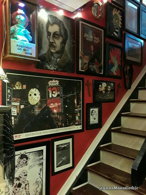 Our home is filled with horror themed room decor & collectables. Our home is 1500 square feet, so we use every inch to our advantage. We have filled the staircase wall with Horror Art from local Florida artists as well as art we have created ourselves. Horror Movie Collection Room, Horror Home Aesthetic, Horror Movie Theater Room, Halloween Themed Room Decor, Movie Theme Room Decor, Horror Office Decor, Scary Movie Room Ideas, Horror Themed Apartment, Horror Movie House Decor