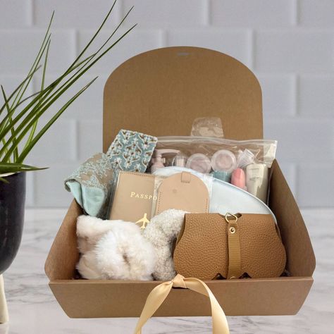 This travel gift box set is perfect for any occasion. Whether it's for a coworker, retirement, friend, or wedding, it offers practical and stylish items for their journeys, making it a thoughtful and memorable gift. https://infinitydesignline.etsy.com/listing/1682374518/travel-accessories-gift-box-destination #travel #travelgifts #travelgram #gifts #gifted #gifting #travelgifts #travelgiftsforher #retirmentgift #friendgift #giftbox #bridesmaidgifts Travel Gift Basket, Travel Kit Gift, Theme Baskets, Gifts For Travelers, Friend Vacation, Bridemaids Gifts, Travel Box, Cozy Socks, Sunglass Holder