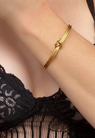 Knot Bangle, Show Piece, Large Feathers, Knot Design, Opening A Boutique, Good To Know, Feather Pendant, Jean Accessories, Gold Branding