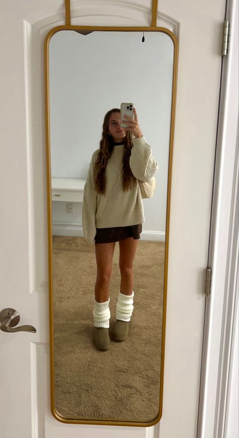 Leg warmers outfit brown dress with cream sweater and Uggs Uggs outfit Belly Thanksgiving Outfit, Cute Fall Outfit Inspiration, Sweater Dress With Leg Warmers, Leg Warmer And Boots, Outfits To Wear On Thanksgiving, Fall Dress Outfit Aesthetic, Tasman Uggs And Leg Warmers, Thanksgiving Outfit Uggs, Cool Girl Thanksgiving Outfit