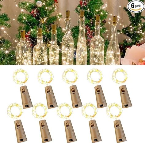 Amazon.com: Etinga 10 Pack Wine Bottle Lights with Cork, 20 LEDs, 6.6 Ft, Fairy Mini String Lights for DIY Jar Halloween, Christmas, Party Decoration, Wedding Listing (10 Pack, Warm White) : Home & Kitchen Wine Bottle Fairy Lights, Restaurant Candles, Wine Bottle Lights, Diy Jar, Lighted Centerpieces, Mini String Lights, Christmas Party Decoration, Iron Candle Holders, Halloween Christmas Decorations