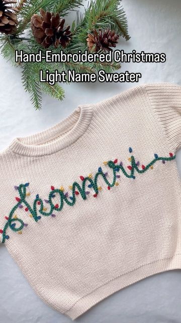 Aspen Lyn Outlet | Hand-Embroidery on Instagram: "Hand-Embroidered Christmas Light Sweater!  I couldn’t wait to share this one! You could totally do this with any of our name kits too I marked out where to put the lights in advance with a water soluble marker to keep them relatively even and the colors well spaced. Just extend the ends of the names on each size and aim for it to finish under the armpit so you can’t see the start and end of the lights!   Who wants to give this a try?  . . . . #diyembroidery #sulky #embroiderykit #beginnerembroidery #embroiderytutorial #embroidery #handembroidery #yarnembroidery #mamaandme #personalizedbabyclothes #babyshower #babyshowergift #newbornoutfit #announcementoutfit #newbabyannouncement #babynamesweater #customsweater #namesweater #embroideredsweat Hand Embroidered Name Sweater, Christmas Sweater Embroidery Ideas, Christmas Embroidered Sweaters, Christmas Embroidery Sweater, Christmas Embroidered Sweater, Sweater Embroidery Ideas, Embroidered Sweaters, Christmas Tattoo, Custom Sweaters