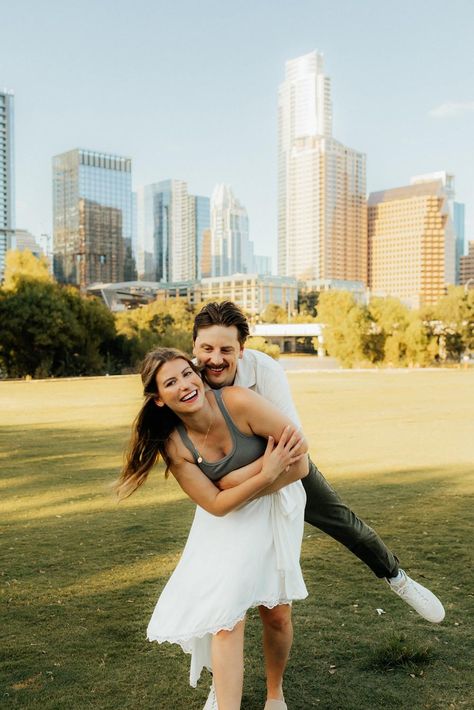 couple-at-auditorium-shores-in-downtown-Austin Downtown Austin Photoshoot, Austin Engagement Photos, Houston Tx Engagement Photos, Austin Texas Engagement Photos, Austin Tx Engagement Photos, Engagement Photos Austin, Downtown Houston Engagement Photos, Zilker Park Austin, Downtown Austin Engagement Photos