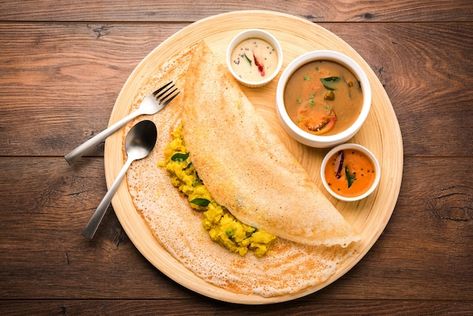 Photo masala dosa is a south indian meal... | Premium Photo #Freepik #photo #dosa #masala-dosa #indian-breakfast #sambar Indian Food Photography, Masala Dosa, Veg Restaurant, Homemade Lunch, Dosa Recipe, Cooking Healthy, Vegetarian Snacks Recipes, Indian Breakfast, Delicacy Food