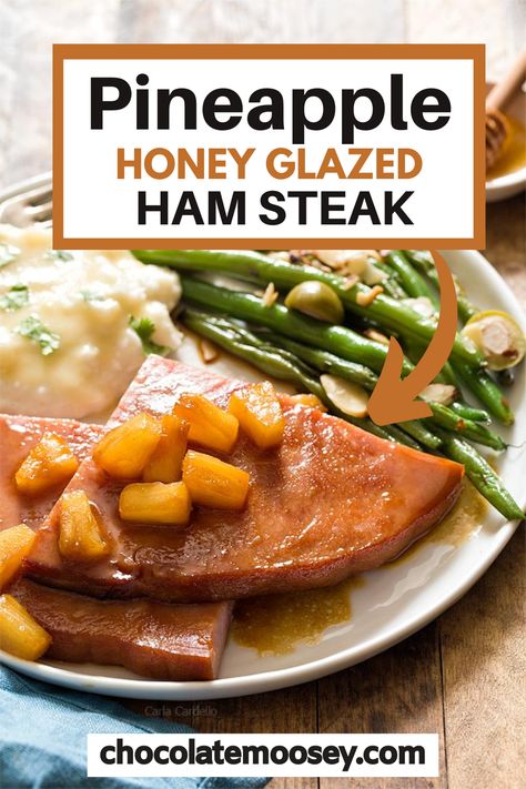 Pineapple Honey Glazed Ham Steak is an easy ham dinner for two that can be ready in under 30 minutes! Fry it on the stovetop or bake in the oven for Easter. The best part about cooking a ham steak dinner is it doesn’t take long to cook at all. You can have this ham steak recipe ready in 15 minutes.  And if that didn’t convince you enough, you fry ham slice on the stovetop, which frees up oven space for your side dishes. Ham Dinners For Two, Pineapple Ham Steak, Honey Glazed Ham Steak, Easy Ham Steak Recipes Simple, Baked Ham Steaks With Pineapple, Slow Cooker Ham Steak, Ham Steak Sides, Ham Steak In Crockpot, Bone In Ham Steak Recipes