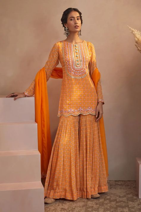 Luxury Chanderi Sharara With Printed Motifs, Luxury Unstitched Chanderi Sharara, Luxury Bandhani Print Sharara In Georgette, Cheap Unstitched Georgette Traditional Wear, Luxury Sharara With Embroidered Border And Straight Kurta, Luxury Straight Kurta Sharara With Intricate Embroidery, Luxury Cotton Silk Sharara With Mirror Work, Luxury Chanderi Sharara For Celebration, Cheap Unstitched Traditional Wear In Georgette