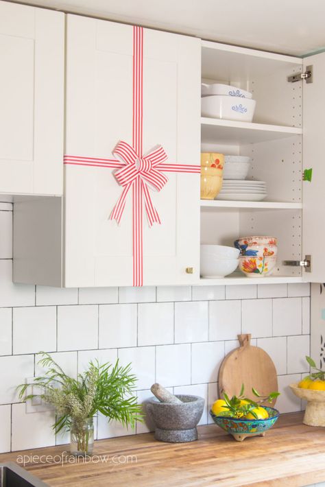 Easy DIY Christmas kitchen cabinet decorations in 30 minutes! 2 beautiful modern & farmhouse decorating ideas with paper & free materials! - A Piece of Rainbow, entryway, living room, bathroom, bedroom, decorating hacks, budget decor, upcycle, snow flocked Christmas wreath, paper crafts, make ribbon bow Kitchen Cabinet Decorations, Modern Farmhouse Decorating, Decorations After Christmas, Diy Christmas Kitchen, Decor Upcycle, Beautiful Modern Farmhouse, Wreath Paper, Ideas With Paper, Decorating Hacks