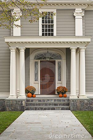 Front Door with Front Porch and Pillars by Dpproductions, via Dreamstime Colonial Front Door, Porch Pillars, Portico Design, Custom Exterior Doors, Exterior Door Designs, Colonial House Exteriors, Exterior House Colors Combinations, Exterior House Paint Color Combinations, Colonial Exterior