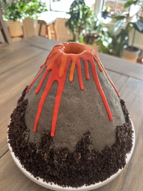 Volcano cake!! Volcano Bundt Cake, Volcano Cakes For Kids, Volcano Dinosaur Cake, Lava Birthday Party, Volcano Birthday Party, Volcano Cupcakes, Volcano Party, Volcano Cake, Honeycomb Cake