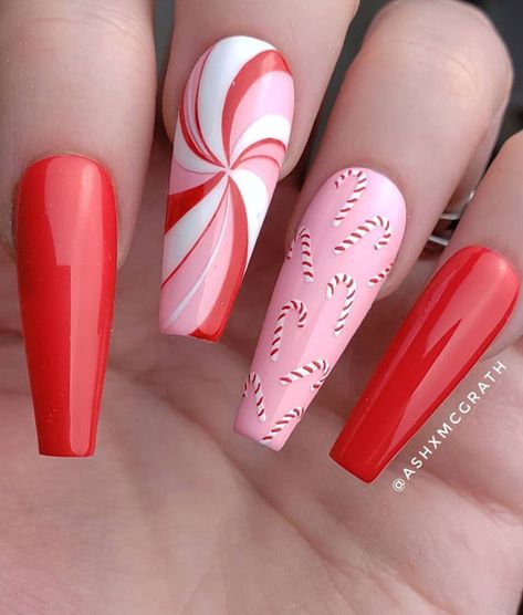 pink and red christmas nails, present red christmas nails, holiday christmas nails, christmas nails 2021 Christmas Acrylic Nails Candy Canes, Christmas Candy Nails Designs, Red And Pink Nails Christmas, Pink Christmas Nails 2022, Pink Red And White Christmas Nails, Pink And Green Holiday Nails, Pink And Red Candy Cane Nails, Red Pink Christmas Nails, Christmas Nails With Pink