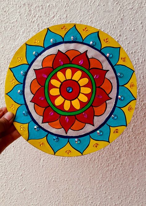 Mandala artwork with paint🎨🖌️ Rangoli Painting On Canvas, Paper Plate Decoration Ideas, Rangoli Mandala Designs, Cd Mandala Art, Rangoli With Paint, Rangoli Designs On Paper, Rangoli On Paper, Rangoli Designs With Paint, Wall Plate Painting Ideas