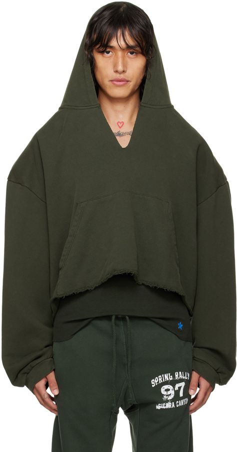 French terry hoodie. · Raw edge at V-neck and cropped hem · Kangaroo pocket · Padded dropped shoulders · Rib knit cuffs Wholesale exclusivity at SSENSE. Supplier color: Green Wocky Slush, Military Hoodie, Yeezy Fashion, Off White Hoodie, Knitted Hoodie, Aesthetic Outfits Men, Yellow Sweatshirt, French Terry Hoodie, Hoodie Green