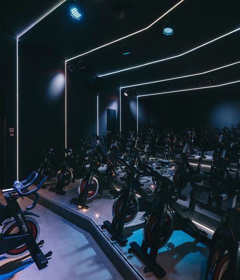 Photo by Invisible Gentleman. Cycle Studio Design, Spin Studio Aesthetic, Spin Studio Design Ideas, Indoor Cycling Studio, Fitness Design Gym, Cycle Studio, Bike Indoor, Boutique Gym, Cycling Studio