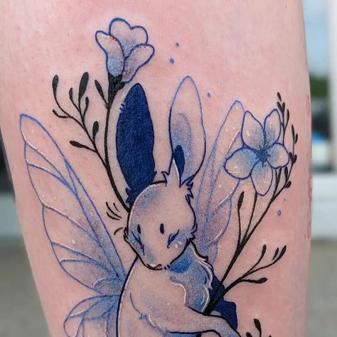 Rosie Cole on Instagram: "Blue 👏 Bunny 👏 Fairy 👏 I love how this tattoo turned out so much 💖 Color + thing is always a fun time. Thanks for getting another bun, Alexa! Took about 2 hours . . . . . . . #michigantattooers #michigantattooartist #midwesttattoo #detroittattooartist #bunnytattoo #bunny #bluetattoo #cutetattoo #pasteltattoo" Black Bunny Tattoo, Cute Bunny Tattoo, Bunny Tattoo Design, Easter Tattoo, Tattoo Rabbit, Hase Tattoos, Fairy Bunny, Bunny Fairy, Michigan Tattoos