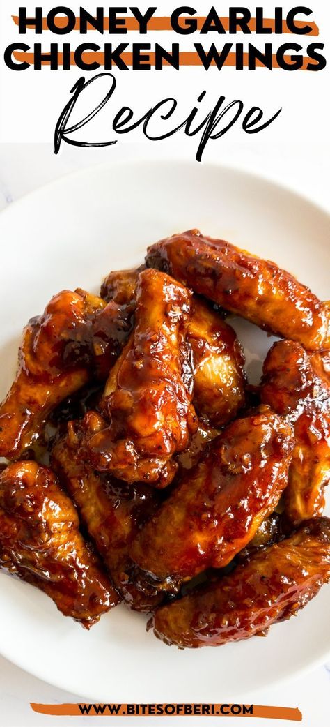 Honey garlic chicken wings make for an incredibly delicious party appetizer! They combine crispy baked chicken wings with a sweet, sticky, and super flavorful soy honey garlic glaze. Trust me, these chicken wings will disappear quickly once they are served! Chicken Wings Honey Garlic, Honey Garlic Chicken Wings Recipe, Yum Yummy Recipes Chicken Wings, Crispy Baked Honey Garlic Chicken, Recipes Yum Chicken Wings, Sticky Honey Garlic Chicken Wings, Sticky Sauce For Wings, What To Do With Chicken Wings, Yum Yummy Chicken Wings