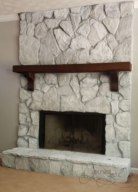 Updating the Fireplace Romabio Nube Gray Fireplace, Grey Brick Fireplace Makeover, Concrete Wash Fireplace, Wall Next To Fireplace Decorating, 70s Rock Fireplace Makeover, How To Paint Fireplace Stone, Can You Paint Stone Fireplace, Painted Cobblestone Fireplace, Brown Painted Mantle