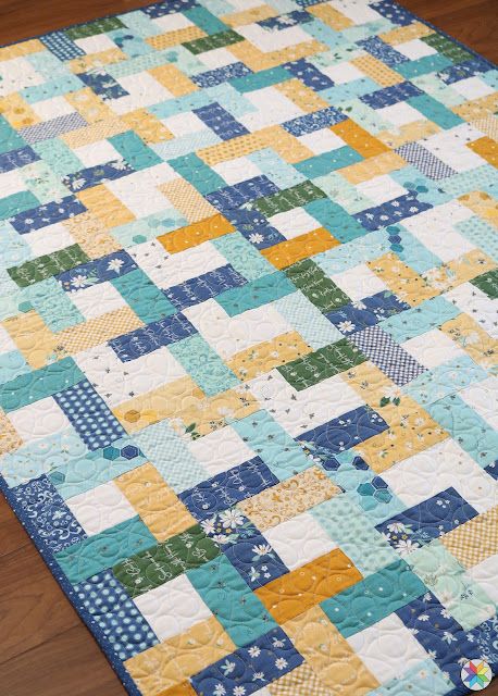 Wrap Around quilt pattern by Andy Knowlton of A Bright Corner -a charm pack friendly free quilt pattern Quilt Patterns Using Squares And Rectangles, Charm Square Quilt Ideas, Around The Block Quilt Pattern, Jellyroll Quilts Patterns Free Easy, Easy Scrappy Quilt Patterns Free, Brightly Quilt Pattern Free, Charm Pack Quilt Ideas, Jellyroll Quilts Easy Free, Free Scrappy Quilt Patterns